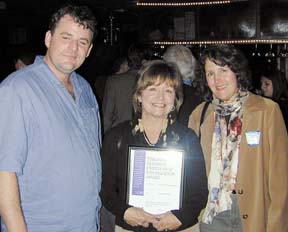 Photo of award to Hank Sims, Judy Hodgson and Emily Gurnon